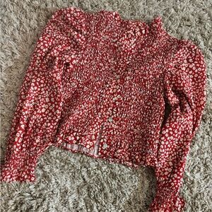 Red floral blouse